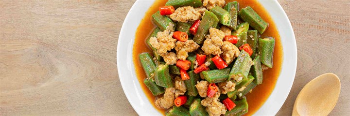 Overhead shot of okra, cauliflower and tomato stir-fry 